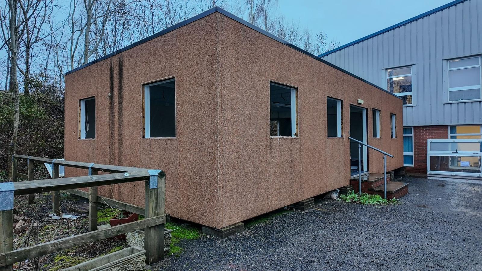 Old porta cabin at a commercial unit before demolition