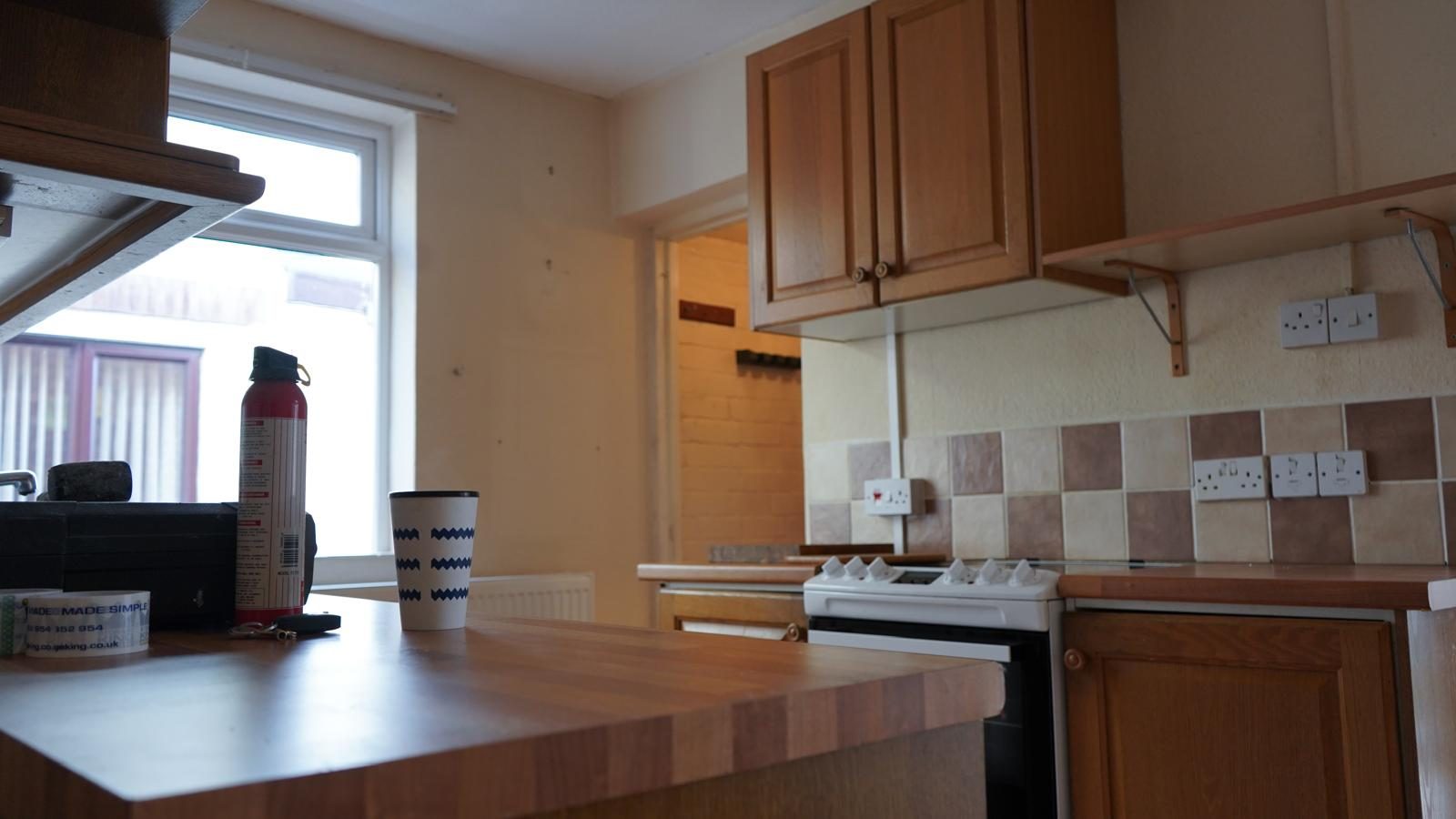 Dated kitchen before removal ahead of an open-plan extension