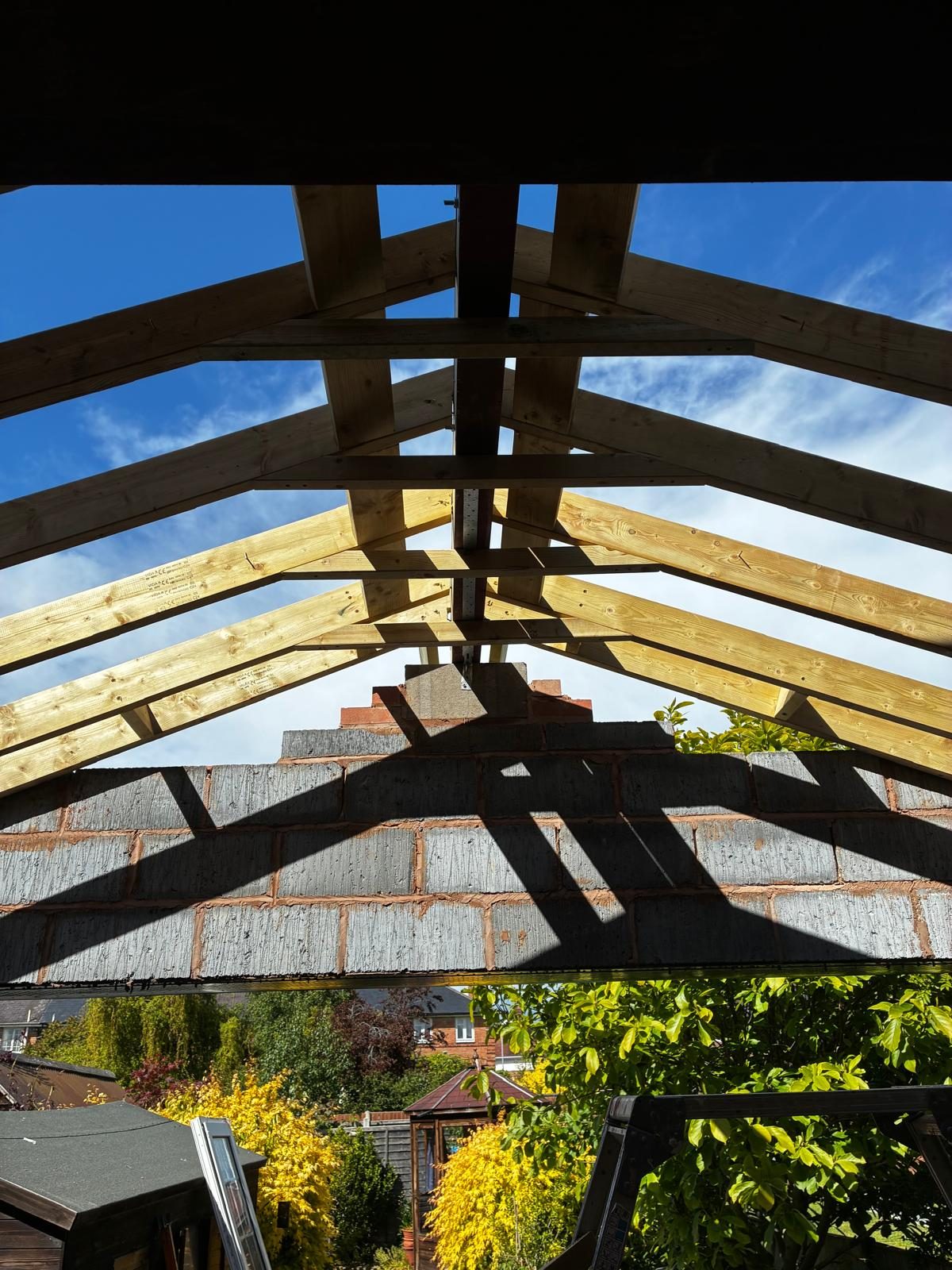 Timber roof rafters cut and fixed on a rear extension