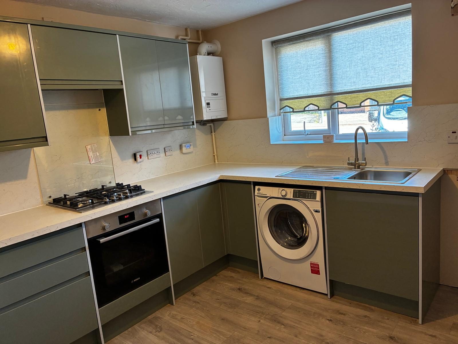 The refitted kitchen by RM Property Renovations Ltd