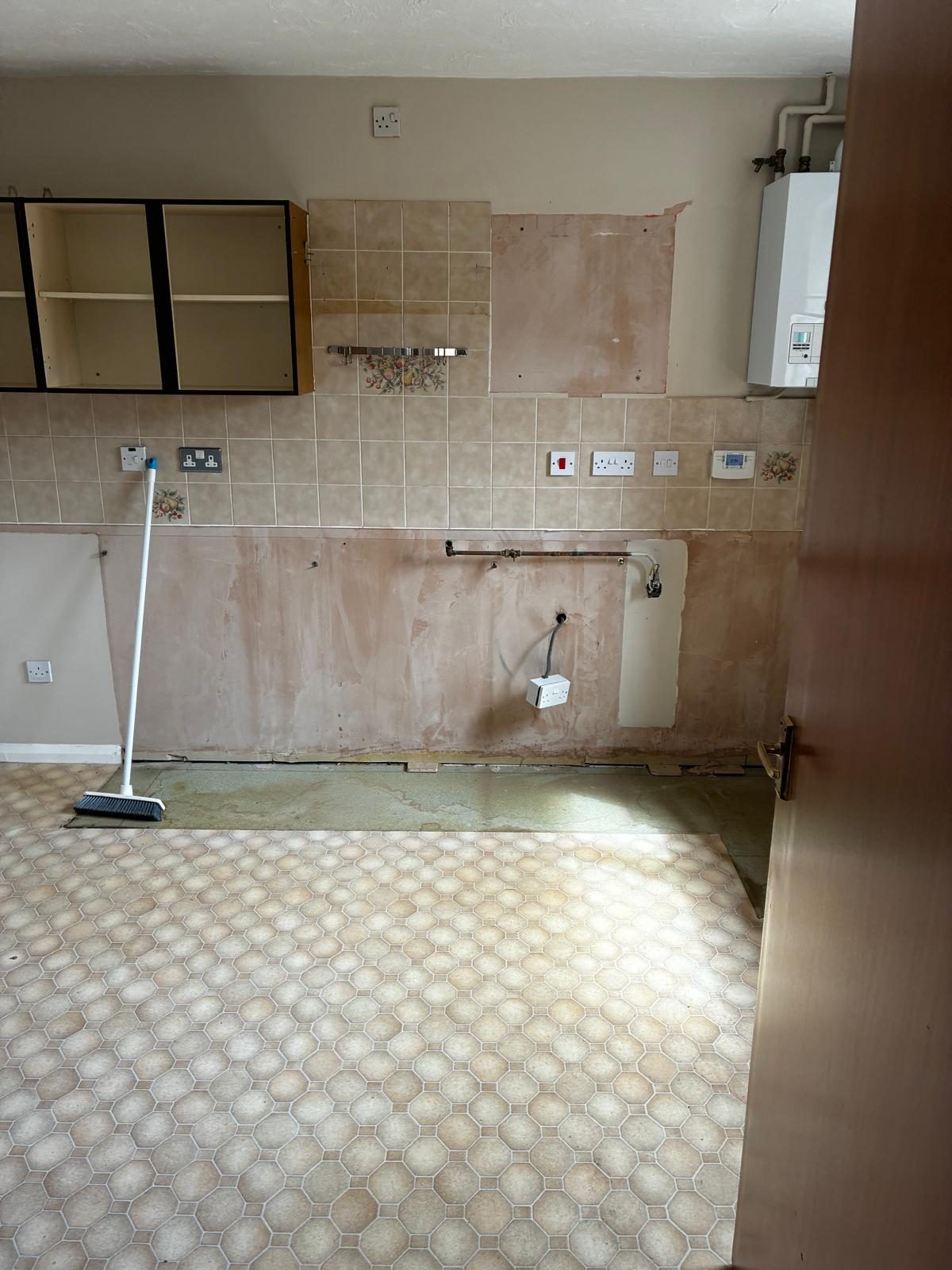 Cleared kitchen ready for installation