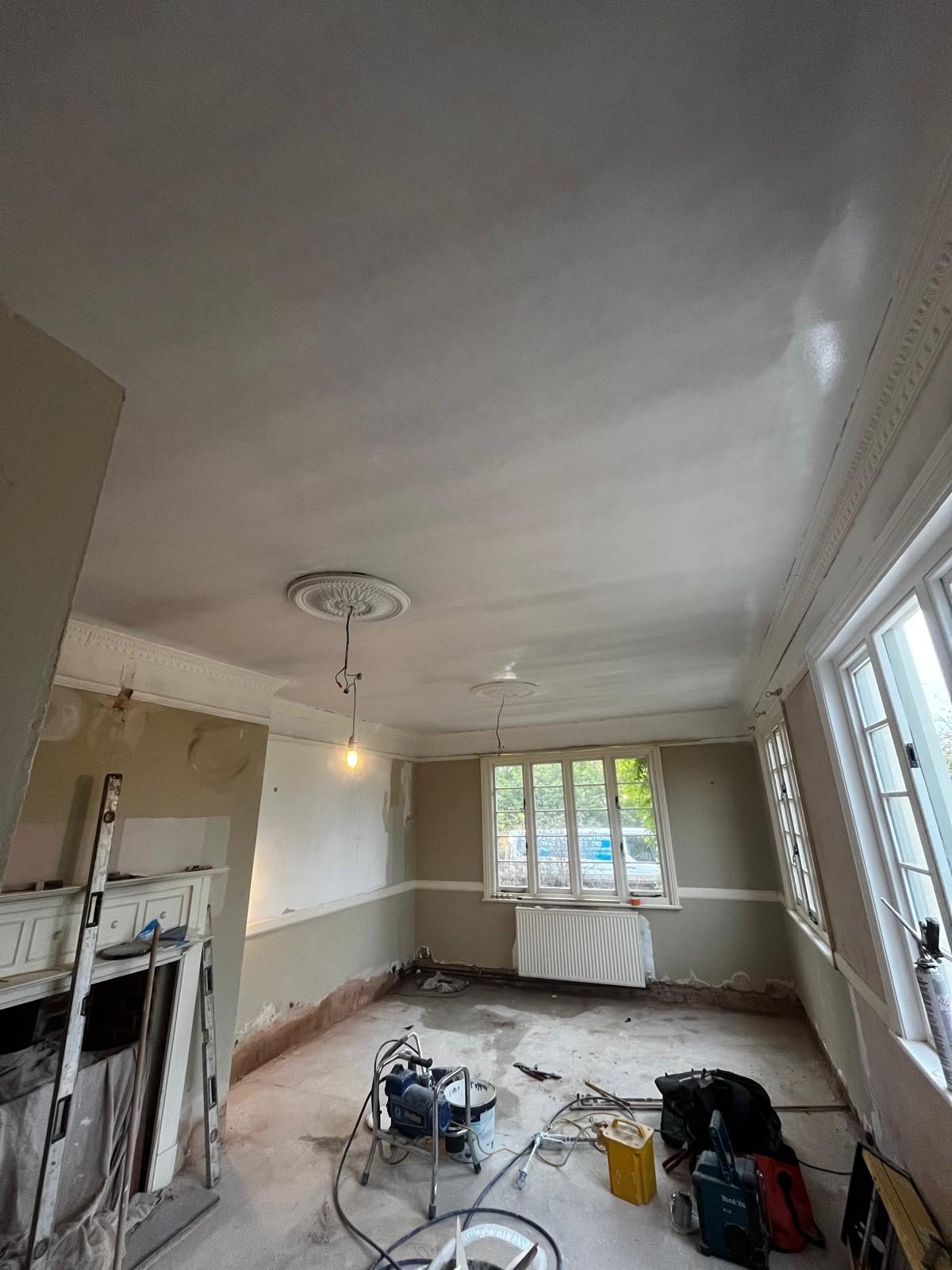 Freshly plastered ceiling in a front room refurbishment