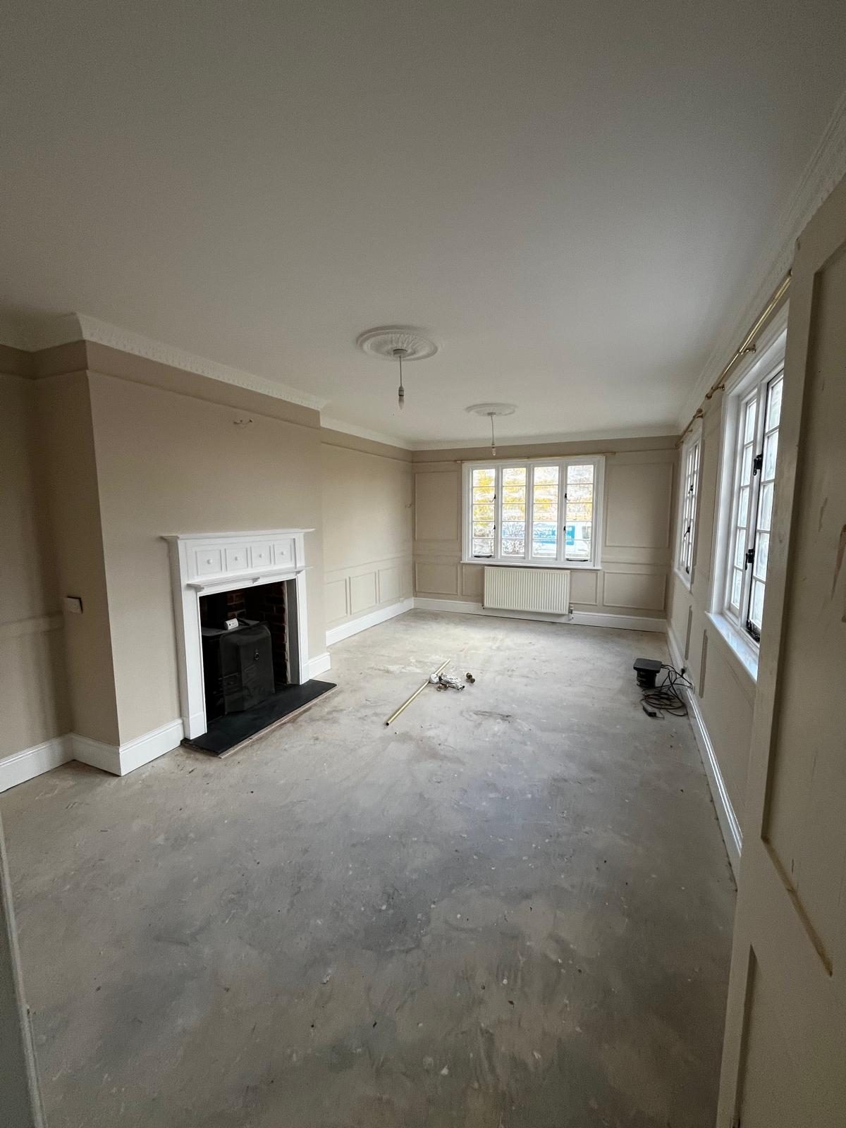 Panelled front room with new plaster cornice